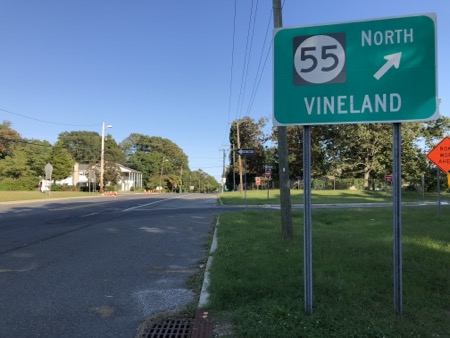 Traffic sign points right towards Vineland along Route 49