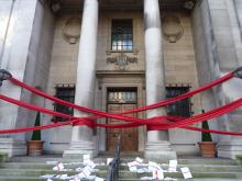 Red tape blocks building entrance